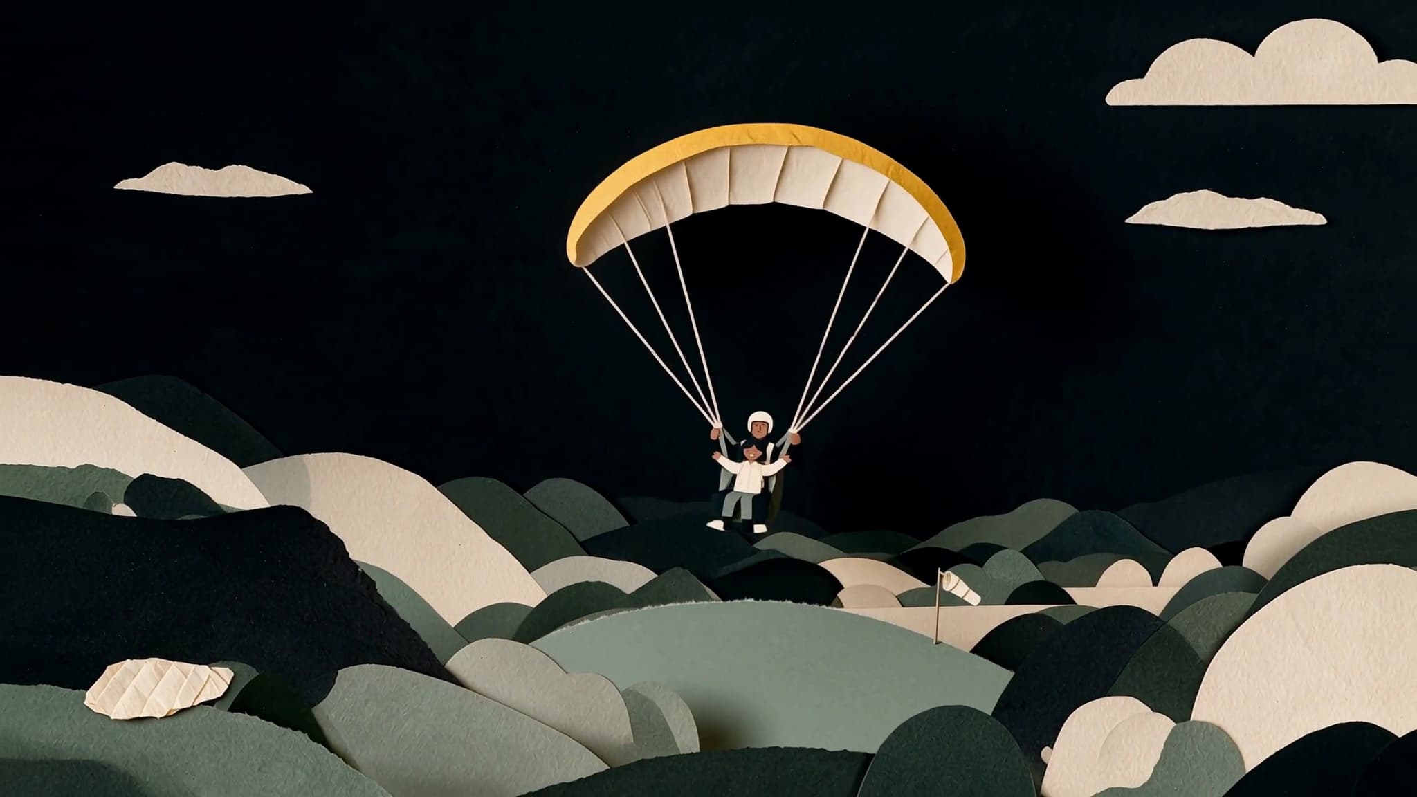 Paper-collage illustration of a traveller on a tandem paraglider flight over layered hills